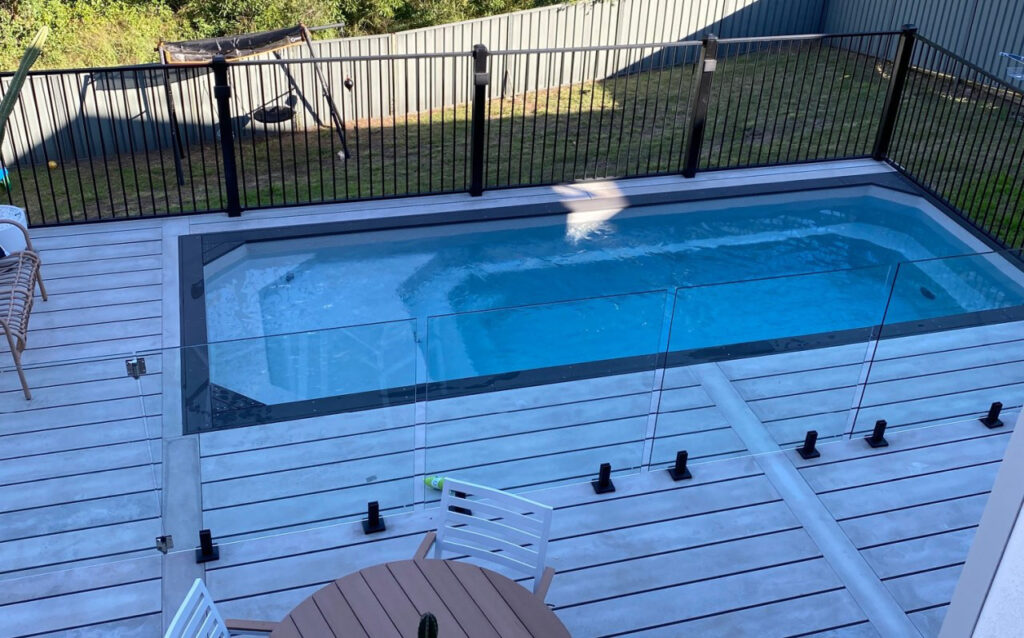 Small pools installed into light wooden deck